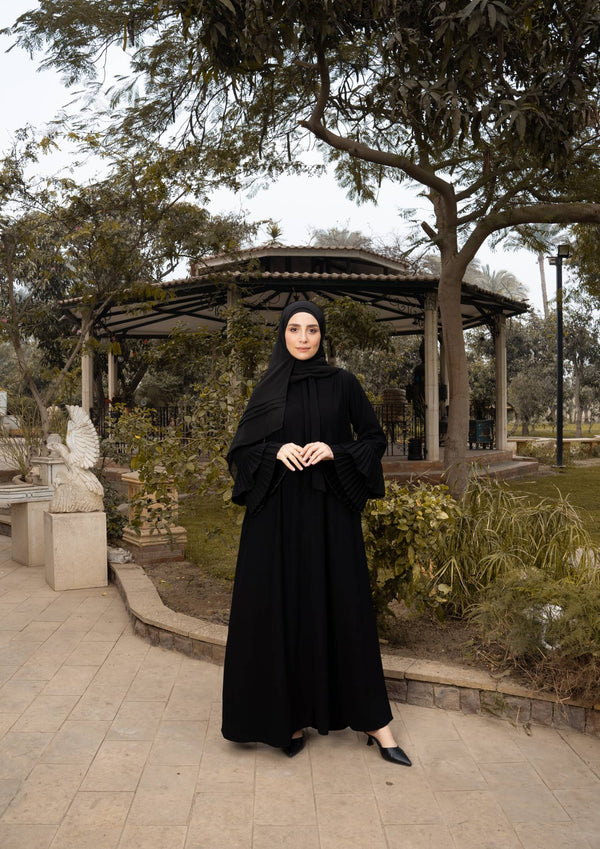 عباية أنيقة بأكمام بليسيه وجيوب جانبية